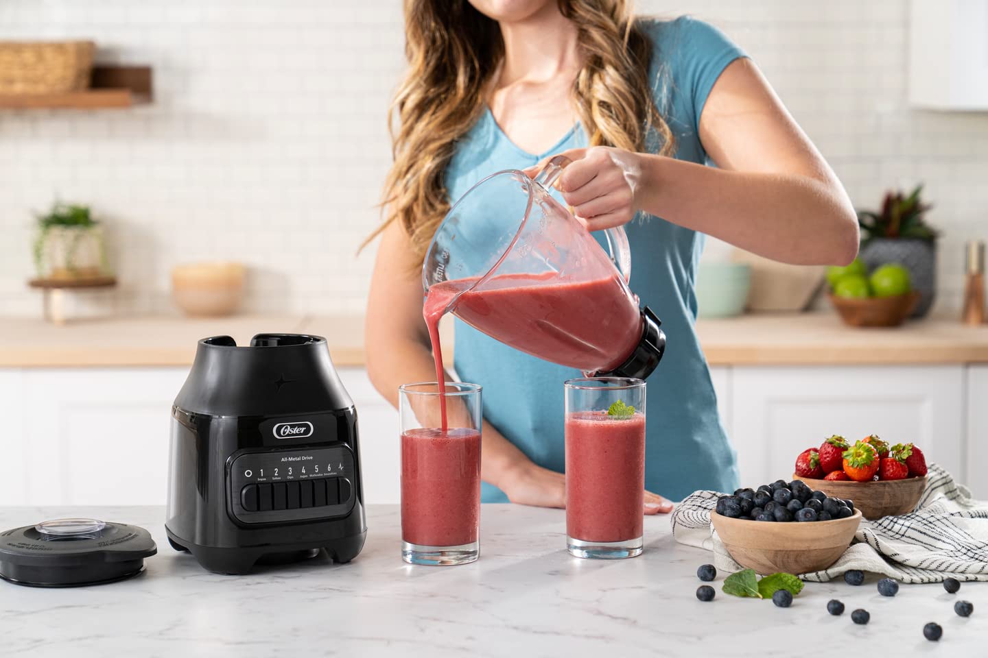 Oster Licuadora con Vaso de Vidrio y 6 Velocidades más Pulso