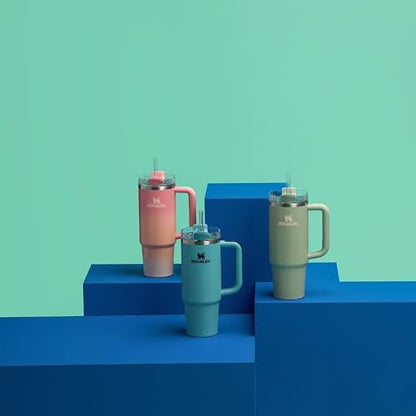 STANLEY - Vaso con asa y popote de 30 onzas, tapa Flowstate de 3 posiciones, compatible para viajes, taza de acero inoxidable aislada, sin BPA, puesta de sol de mesa rosa