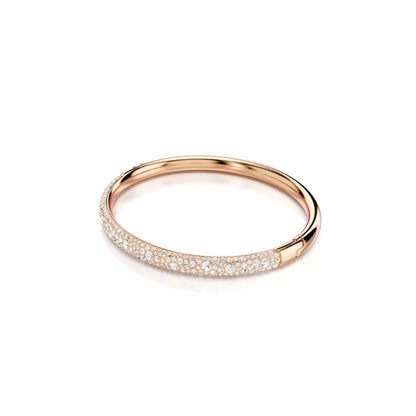 pulsera Swarovski Meteora, pavé de nieve, cristales transparentes en metal con acabado en tono oro rosa