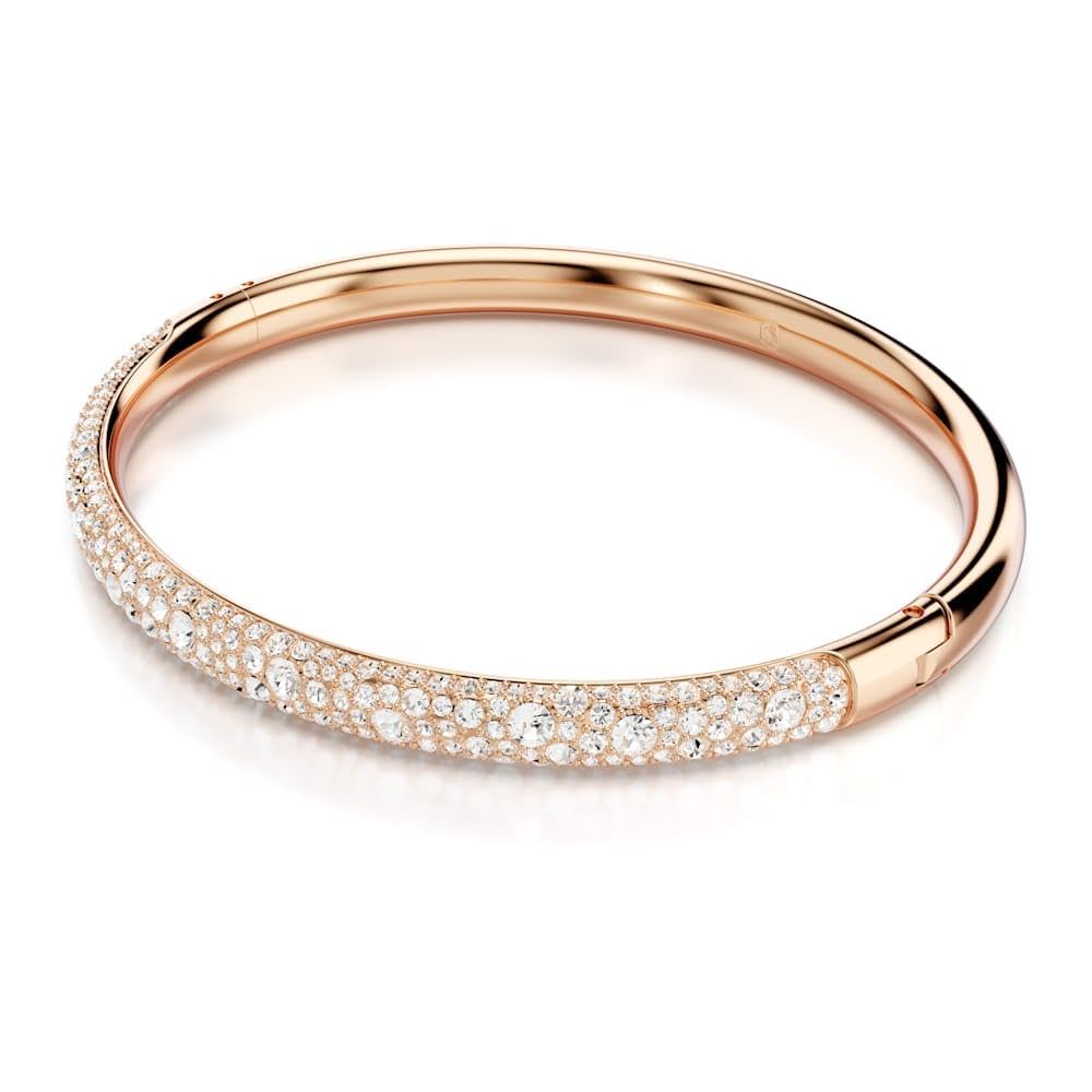 pulsera Swarovski Meteora, pavé de nieve, cristales transparentes en metal con acabado en tono oro rosa
