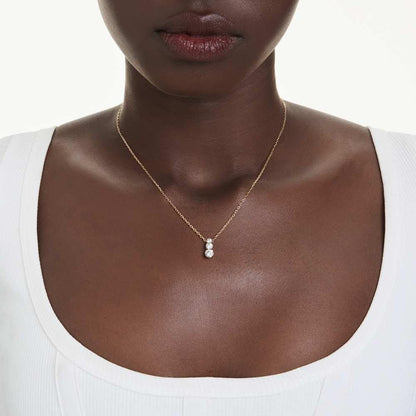 Swarovski Colgante Stilla Attract, Talla redonda, Blanco, Baño tono oro