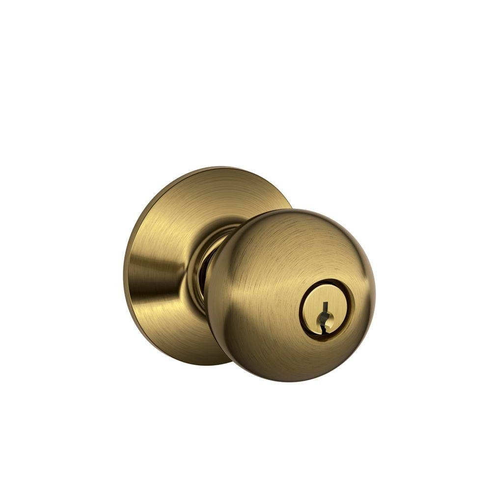 Schlage Cerradura Mecánica para Puerta, Línea Tradicional - Órbita - Estándar - Antique Brass