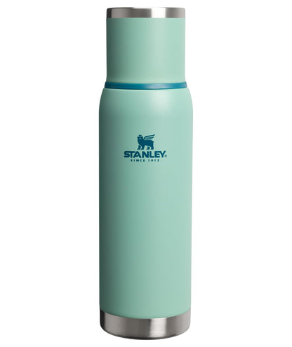 Stanley Adventure-To-Go - Botella al aspiradora de 1.1 cuartos | Boca ancha con tapa de copa a prueba de fugas, mantiene las bebidas calientes o frías | Plegable para viajes | Botella térmica de acero - Verde primavera - 1 Litros