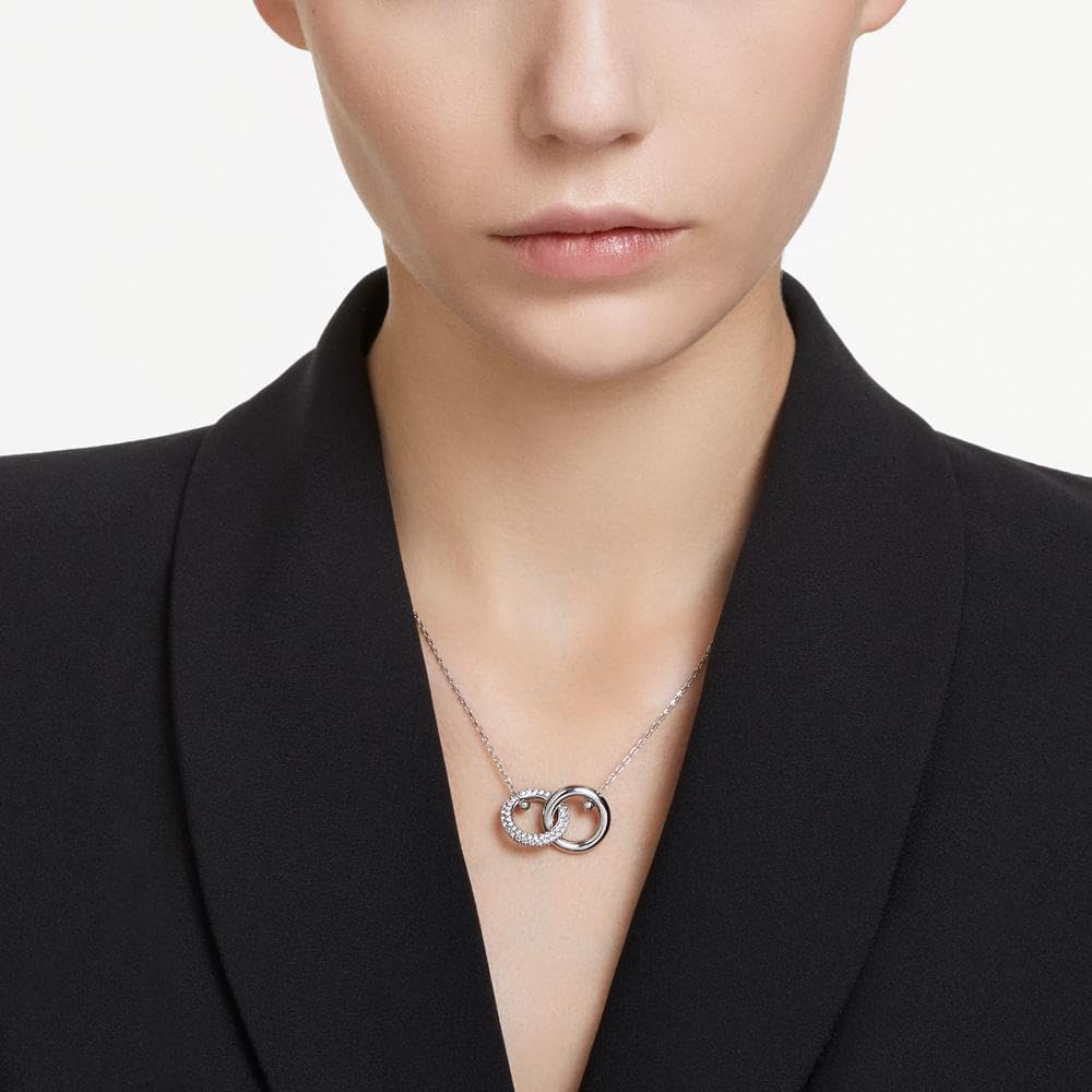 SWAROVSKI Dextera - Collar con colgante con lazo entrelazado y cristales transparentes