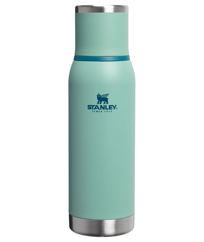 Stanley Adventure-To-Go - Botella al aspiradora de 25 onzas, boca ancha con tapa a prueba de fugas, mantiene las bebidas calientes o frías, plegable para viajes, botella térmica de acero inoxidable - Verde primavera - 0.7 Litros