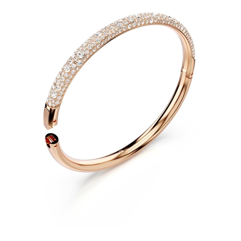 pulsera Swarovski Meteora, pavé de nieve, cristales transparentes en metal con acabado en tono oro rosa