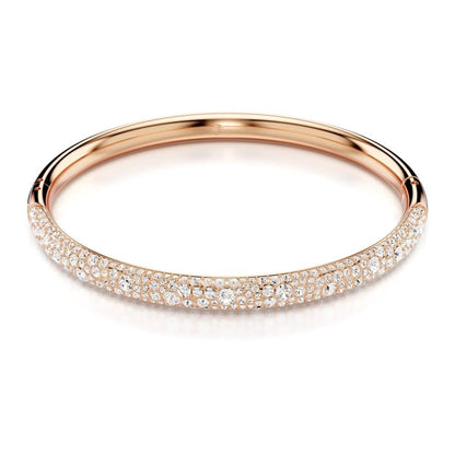 pulsera Swarovski Meteora, pavé de nieve, cristales transparentes en metal con acabado en tono oro rosa