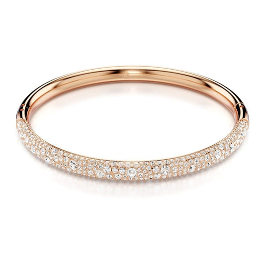 pulsera Swarovski Meteora, pavé de nieve, cristales transparentes en metal con acabado en tono oro rosa
