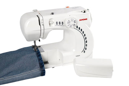 Janome 1000A Máquina de Coser Mecánica Portátil, 6 Puntadas, Ojal en 4 Pasos y Brazo Libre – Ideal para Principiantes y Mezclilla
