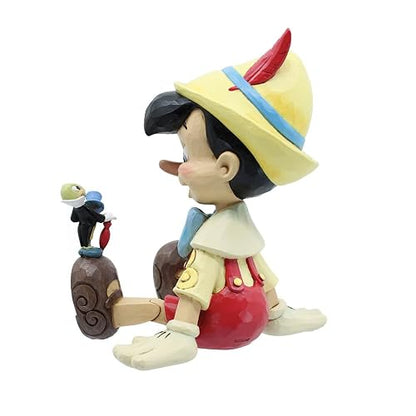 Enesco Jim Shore Disney Traditions Pinocho y Jiminy Figura sentada de 6 Pulgadas