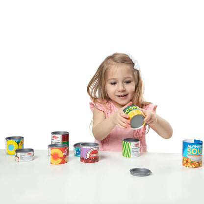 Melissa & Doug ¡Juguemos de Casita! Set de Alimentos Enlatados, Juego de Imitación, Tapas Abatibles, Construcción de Cartón Resistente (10 Latas)