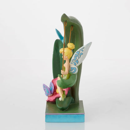 Enesco Disney Traditions Collection by Jim Shore Peter Pan Tinker Bell Spring Swing Figurita de resina de piedra pintada a mano coleccionable Disney Tink Figurines para decoración del hogar, 8.63