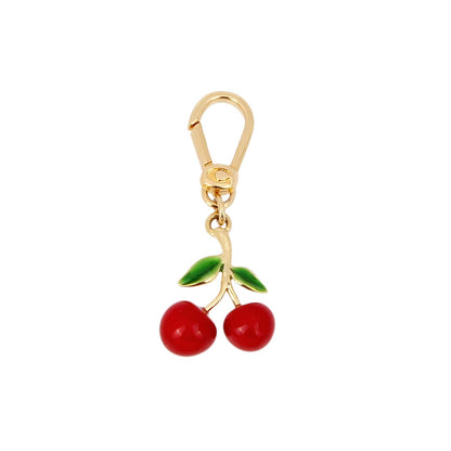 COACH - Abalorio de cereza coleccionable