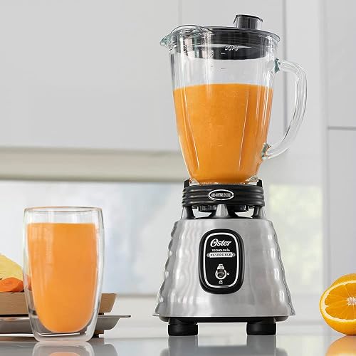 Licuadora clásica Oster reversible cromada vaso de vidrio BLSTBESTE013