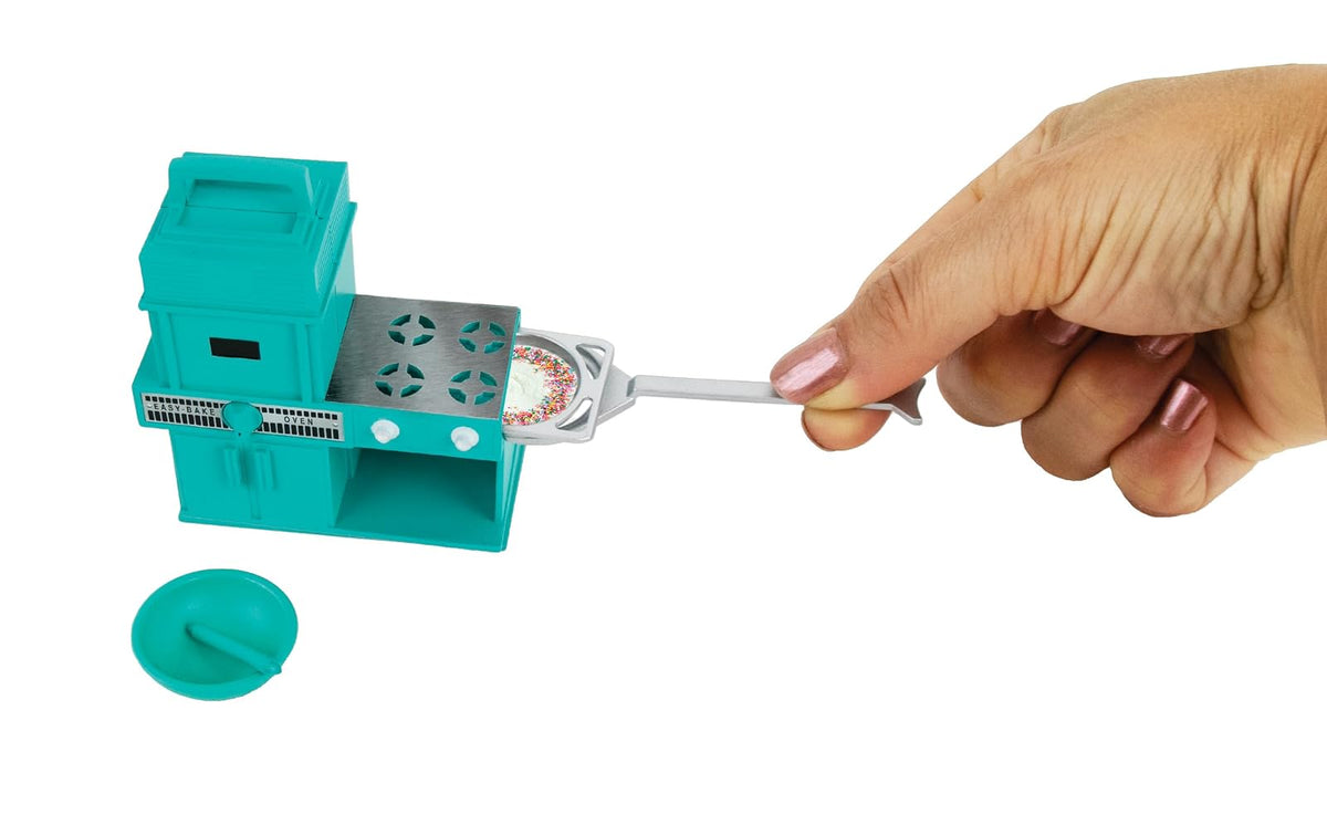 Worlds Smallest Horno fácil de Hornear más pequeño del Mundo. Disponible en Dos Colores, Turquesa y Oro de Cosecha. Colores seleccionados al Azar.
