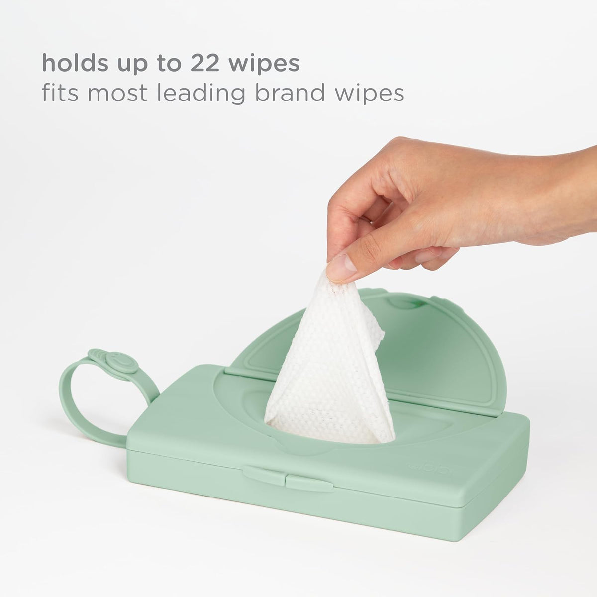 Ubbi On-The-Go - Dispensador de toallitas para bebé, contenedor portátil para viajes, accesorio imprescindible para recién nacidos, soporte para toallitas reutilizables, color verde salvia
