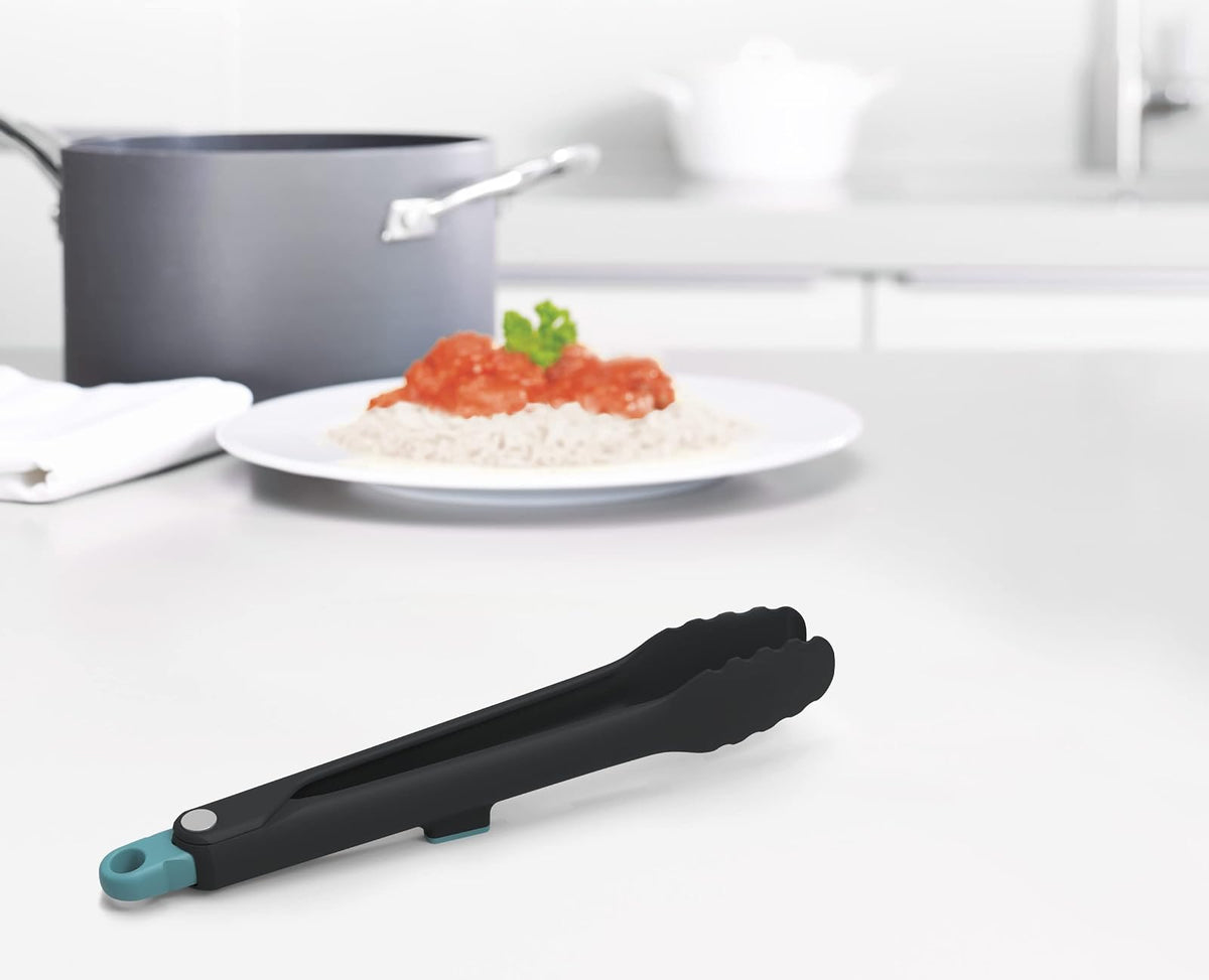 Joseph Joseph Duo - Pinzas higiénicas con soporte integrado para herramientas y pies antideslizantes, adecuadas para utensilios de cocina antiadherentes, resistentes al calor, sin BPA