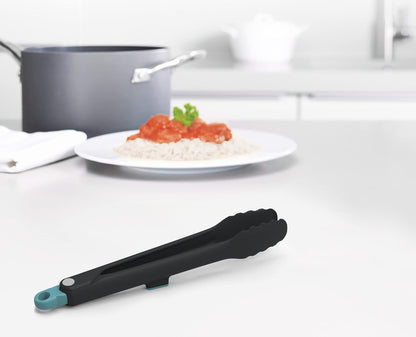 Joseph Joseph Duo - Pinzas higiénicas con soporte integrado para herramientas y pies antideslizantes, adecuadas para utensilios de cocina antiadherentes, resistentes al calor, sin BPA