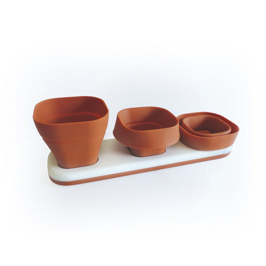 Infusion Living - Macetas Convertibles con Ventana para Cultivar Semillas de Hierbas, Silicona, Color Terra Cotta, Juego de 3 macetas con Base empotrada