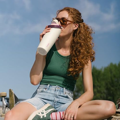 Owala FreeSip Sway Botella de agua aislada de acero inoxidable con boquilla bidireccional, popote integrado y asa tipo cubo, 40 oz, libre de BPA, a prueba de fugas, Pastel De Ángel Rosa