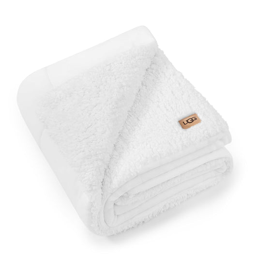UGG Nita - Manta Suave Reversible de Felpa para sofá o Cama, acogedora Manta cálida y esponjosa para Sala de Estar o Bonita decoración de recámara, Lavable alternativamente, 50 x 70 Pulgadas, Nieve