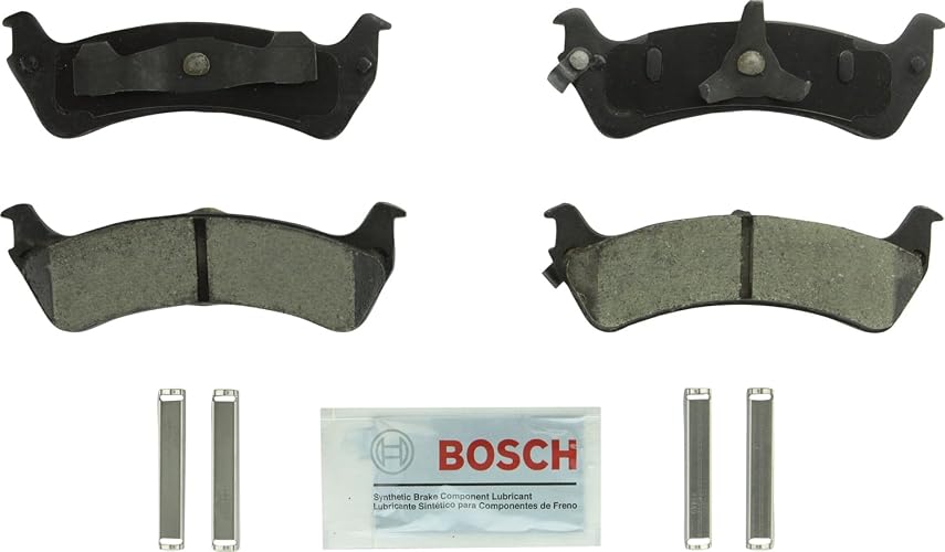 BOSCH BC667 QuietCast Juego de pastillas de freno de disco de cerámica premium - Compatible con Ford Explorer, Explorer Sport, Explorer Sport Trac; Mercury Mountaineer; trasero