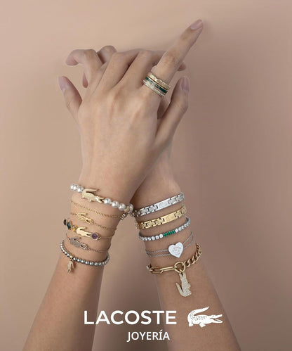 Lacoste - Pulsera para Mujer Dorada Acero Inoxidable Cadena Fina Diseño Elegante Moderno Joyería Original Regalo Mujer.