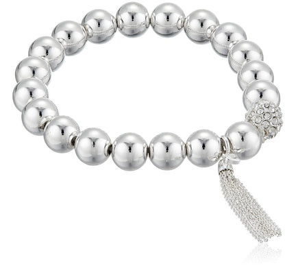 Nine West - Pulsera elástica con Borla para Mujer, Color Plateado