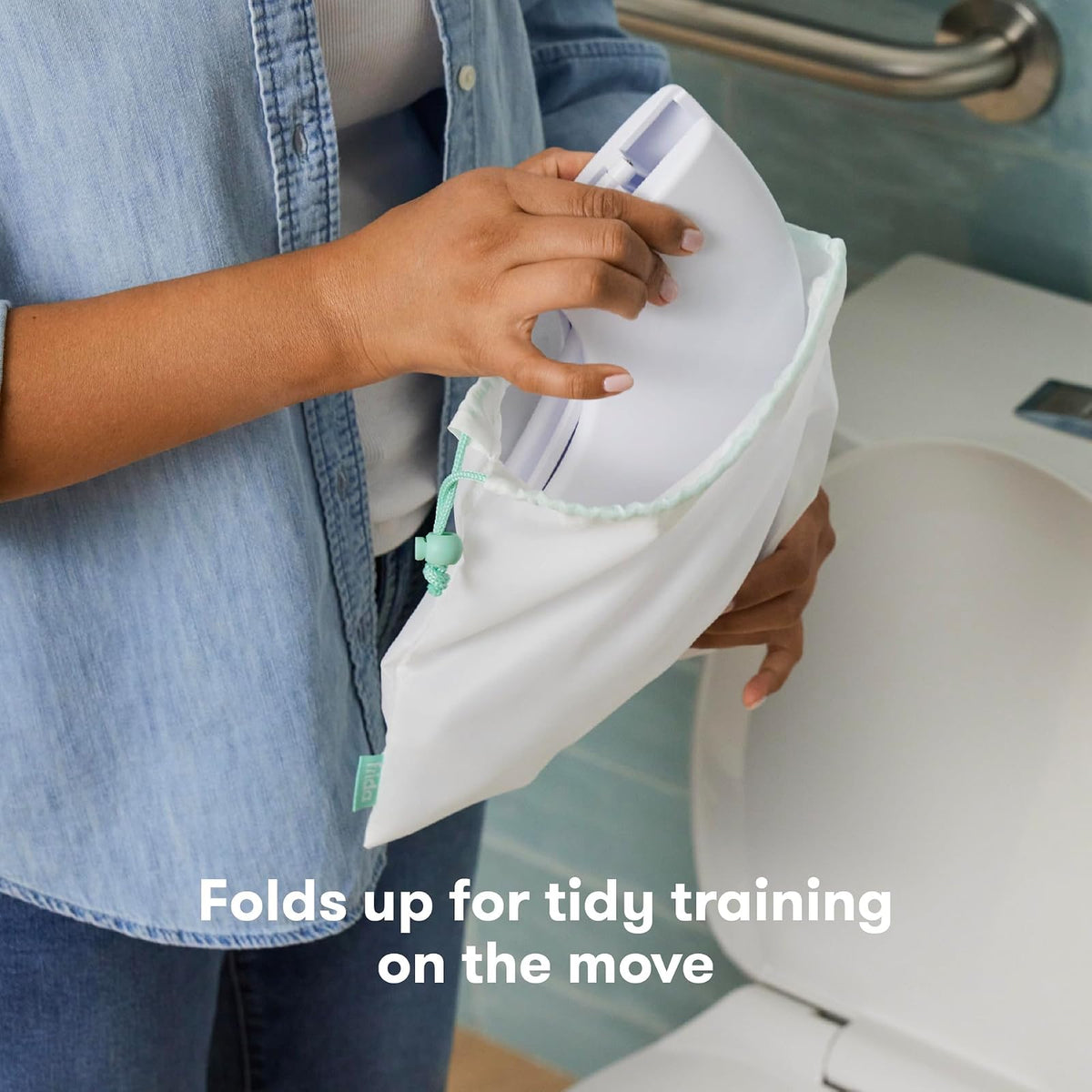 Frida - Asiento portátil plegable para inodoro para bebé, asiento plegable para orinal de viaje para niños pequeños, se adapta a inodoros redondos y ovalados, base antideslizante, asas, incluye bolsa