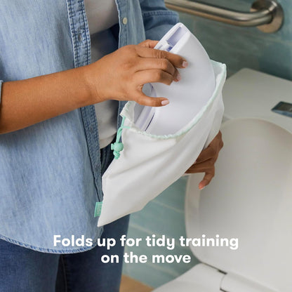 Frida - Asiento portátil plegable para inodoro para bebé, asiento plegable para orinal de viaje para niños pequeños, se adapta a inodoros redondos y ovalados, base antideslizante, asas, incluye bolsa