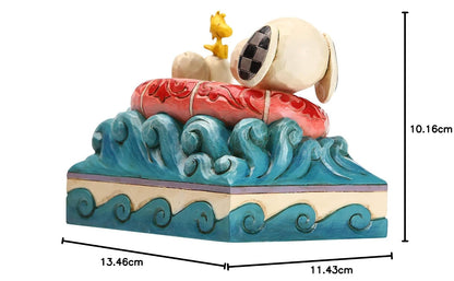 Enesco Peanuts de Jim Shore Snoopy y Woodstock en Figura Flotante, 10 cm, Multicolor