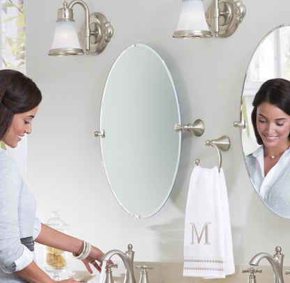 Moen Glenshire DN2692BN - Espejo de baño Giratorio sin Marco, níquel Cepillado, 26 x 22 Pulgadas, Espejo de Pared inclinable Ovalado