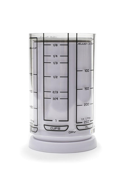 KitchenArt Taza Medidora Ajustable de 2 Tazas, Color Blanco | Taza medidora de émbolo | Mide entre 1/8 taza y 1 taza | Incluye conversiones | Gadget de cocina | Mide sólidos y líquidos