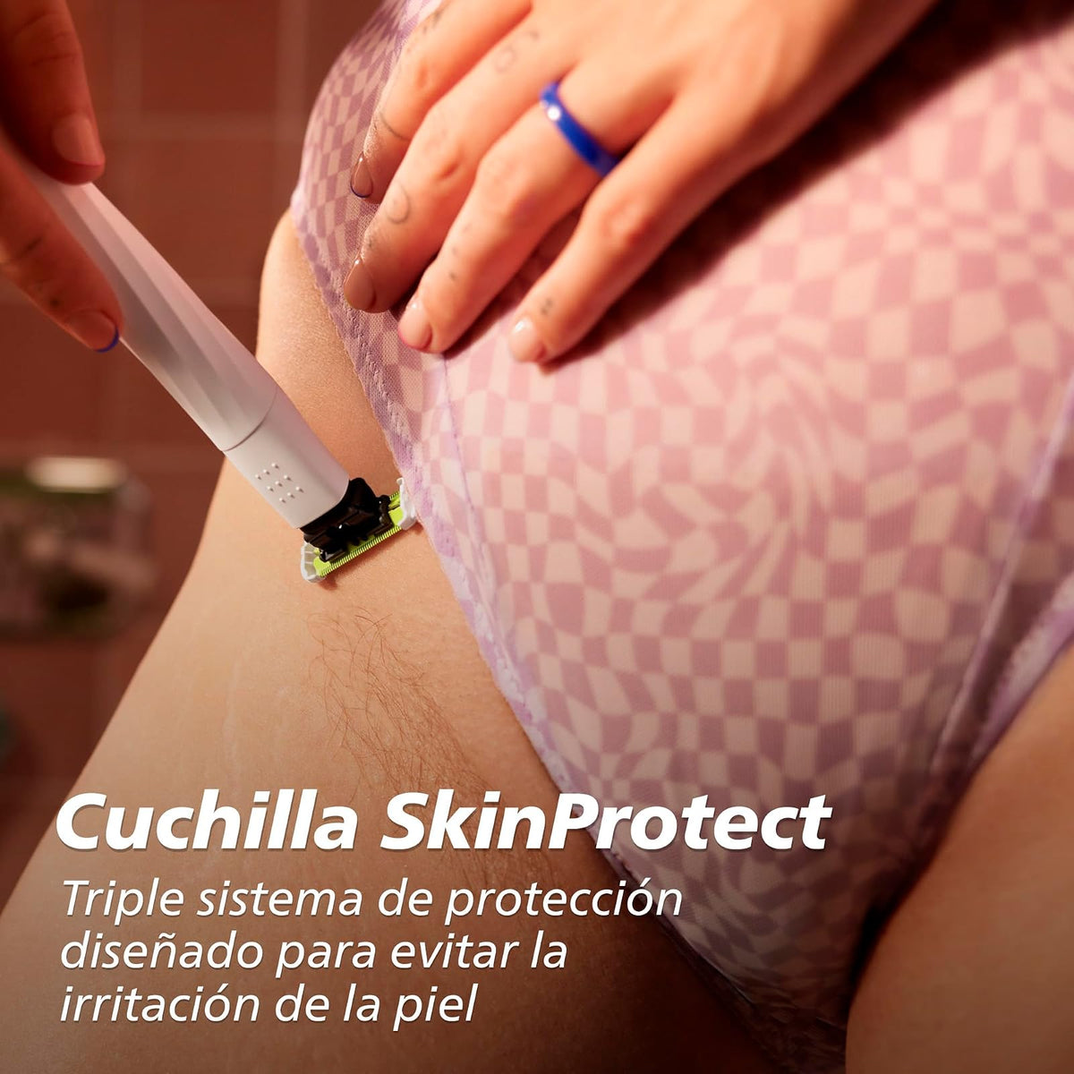 Philips OneBlade Intimate Afeitadora y Recortadora para Zonas Íntimas | Mayor protección en áreas sensibles | Mujer | 2 cuchillas SkinProtect + Peine Corporal | Zonas íntimas y axilas | QP1924/50