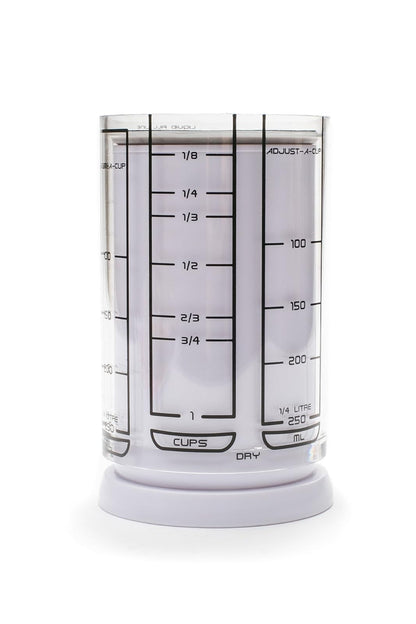KitchenArt Taza Medidora Ajustable de 2 Tazas, Color Blanco | Taza medidora de émbolo | Mide entre 1/8 taza y 1 taza | Incluye conversiones | Gadget de cocina | Mide sólidos y líquidos