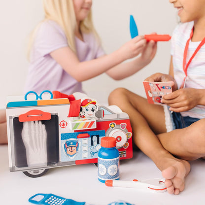 Melissa & Doug Paw Patrol Vehículo EMT de Rescate de Marshall, Juguete de Madera (14 Piezas)