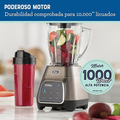 Oster® Licuadora, con Tecnología Reversible y Pantalla Táctil, 3 Velocidades y 2 Programas automáticos, 1000 W, Incluye un vaso Blend-N-Go, Plateada, BLSTPYG1312XBG