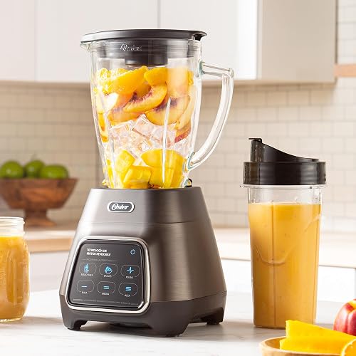 Oster® Licuadora, con Tecnología Reversible y Pantalla Táctil, 3 Velocidades y 2 Programas automáticos, 1000 W, Incluye un vaso Blend-N-Go, Plateada, BLSTPYG1312XBG