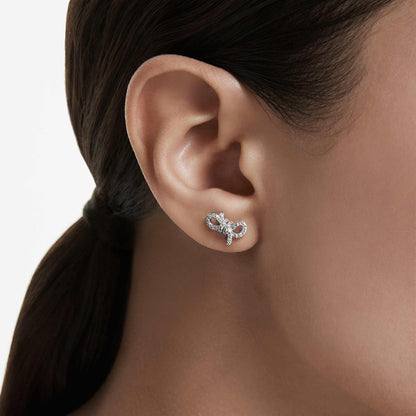 arete Swarovski Lifelong, pavé, lazo, blanco, baño de rodio