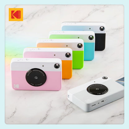 KODAK Printomatic Instant Camera (Blue) Gift Bundle + Zink Paper (20 Sheets) + Deluxe Case + 7 Fun Sticker Sets + Twin Tip Markers + Photo Album.