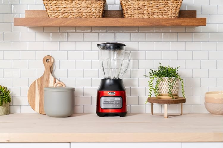 Oster Licuadora 800 W con Vaso de Vidrio de 1.5 L, 2 Programas Automáticos | 3 Velocidades + Pulso, motor reversible, acople metálico y cuchilla que tritura hielo, rojo, BLSTPEG-CRT