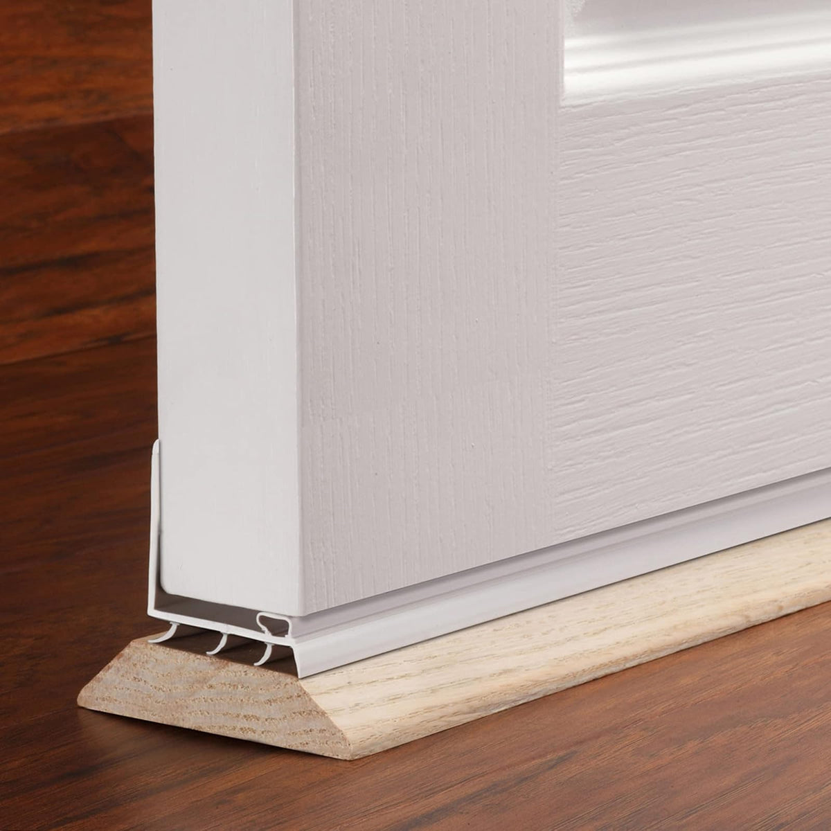M-D Building Products 43816 36 pulgadas. Sello de vinilo blanco en forma de L para debajo de la puerta