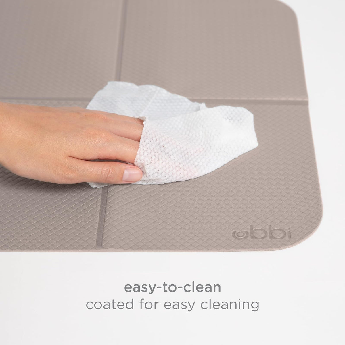 Ubbi On-The-Go - Tapete para cambiar pañales para bebé, suave y cómoda, accesorio imprescindible para recién nacidos, fácil de limpiar, almohadilla plegable portátil, accesorios de viaje para bebé,