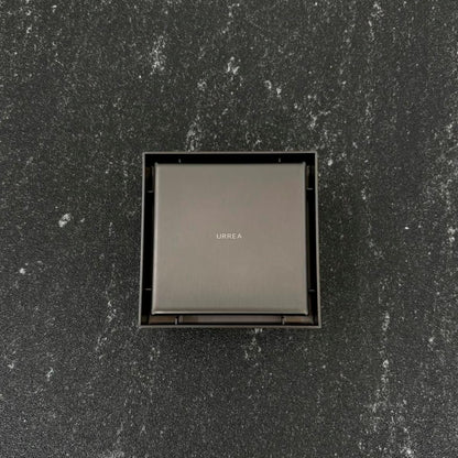 URREA Coladera de Acero Inoxidable, Cuadrada con Rejilla, Acabado Gun Metal, Válvula Check Anti Olor, Desalojo de 40 Lts x Min, CCRINOX.41