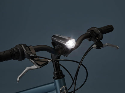 Schwinn - Juego de luces LED para bicicleta, faros delanteros recargables por USB y luz trasera que funciona con pilas, con correa de silicona de montaje sin herramientas, pieza de bicicleta y