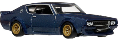 Hot Wheels Collector Cultura Automotriz Nissan Skyline 2GT-R, Auto 1:64 Metal/Metal y Real Riders, para colección y exhibición, 3 años en adelante