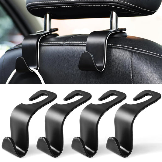 LivTee - Ganchos para los reposacabezas del asiento del coche, de color negro, para bolsos, ropa, abrigos o bolsas de la compra, juego de 4