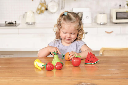 Hape , Juego de rol , Frutas Saludables con Cuchillo de Juguete Realista para Aprender y Jugar. Accesorio Cocina. De 2 a 8 años. E3171