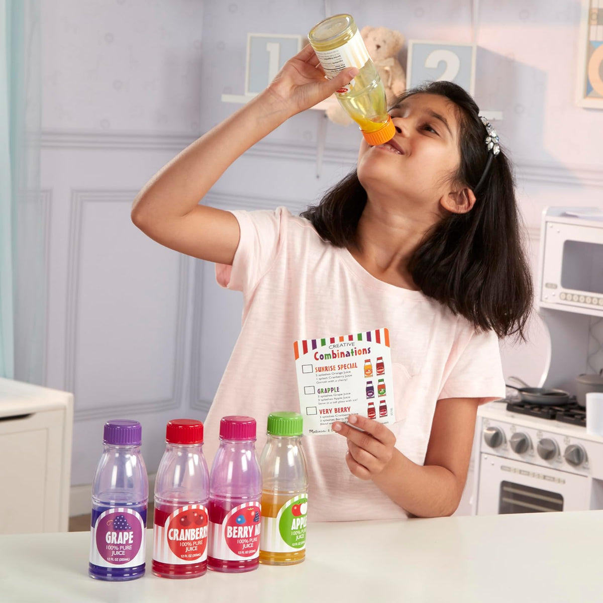 Melissa & Doug Tip & Sip - juguete de botellas de jugos y tarjeta de actividades (6 pzas.)