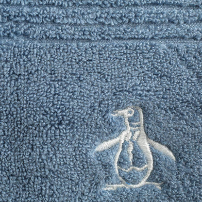 The Original Penguin, Toalla Medio Baño 100% Algodón, Color Azul, Donegal.